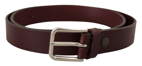 Maroon calf leather belt with silver tone metal buckle from Dolce & Gabbana, showing the belt laid flat with buckle detail.