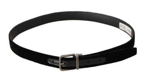 Black velvet belt with engraved metal buckle featuring Dolce & Gabbana logo, classic and stylish accessory.