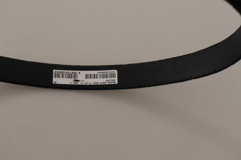 Black velvet and leather belt by Dolce & Gabbana with a gold-tone metal buckle, stylish accessory for women.