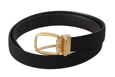 Black canvas and leather belt with gold metal buckle from Dolce & Gabbana, featuring a sleek and stylish design.