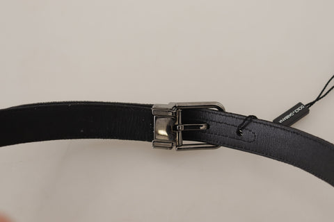Black cotton belt with silver-tone metal buckle by Dolce & Gabbana, featuring a sleek and stylish design.
