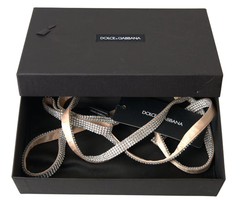 Beige silk waist belt with clear crystal bow detail from Dolce & Gabbana, styled around the waist for elegant fashion.