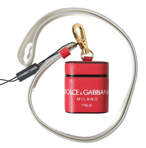 Red leather AirPods case with gold-tone metal logo print by Dolce & Gabbana, featuring a sleek and stylish design.