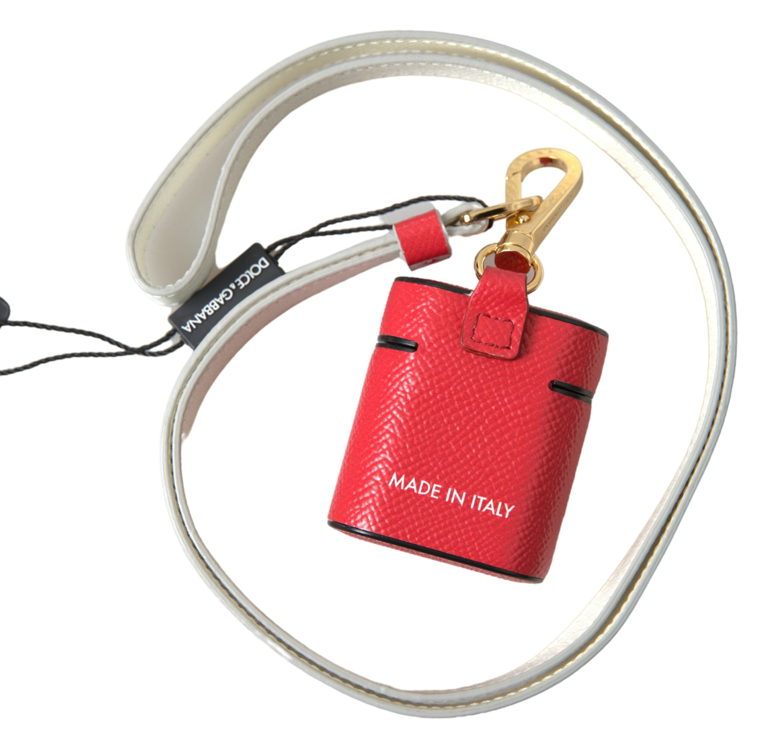 Red leather AirPods case with gold-tone metal logo print by Dolce & Gabbana, featuring a stylish and protective accessory.