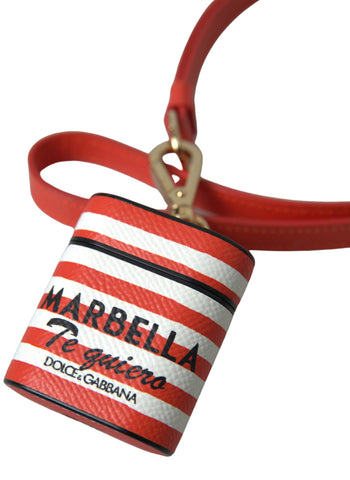 Orange stripe leather AirPods case with Dolce & Gabbana logo strap, featuring a dauphine style design and secure closure.