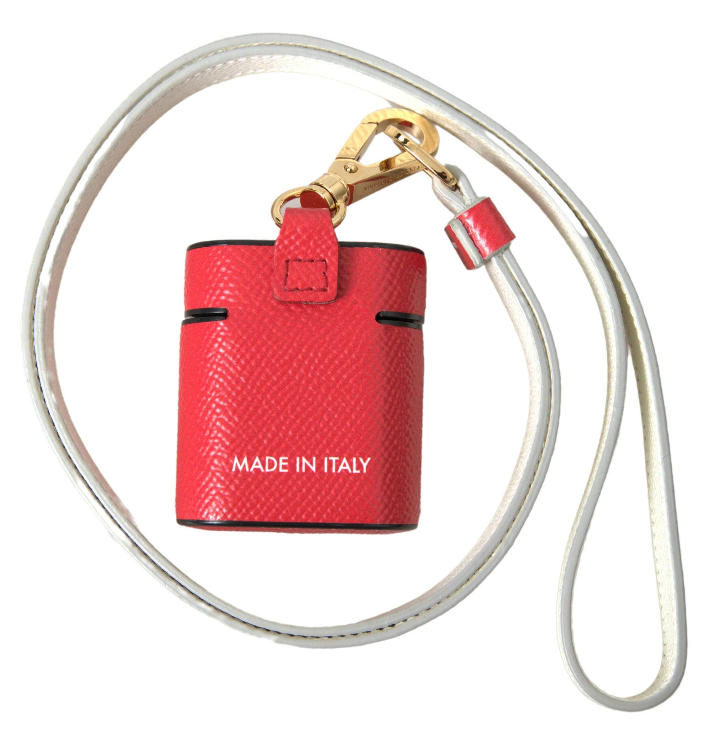 Red leather AirPods case with gold-tone metal logo print strap from Dolce & Gabbana.