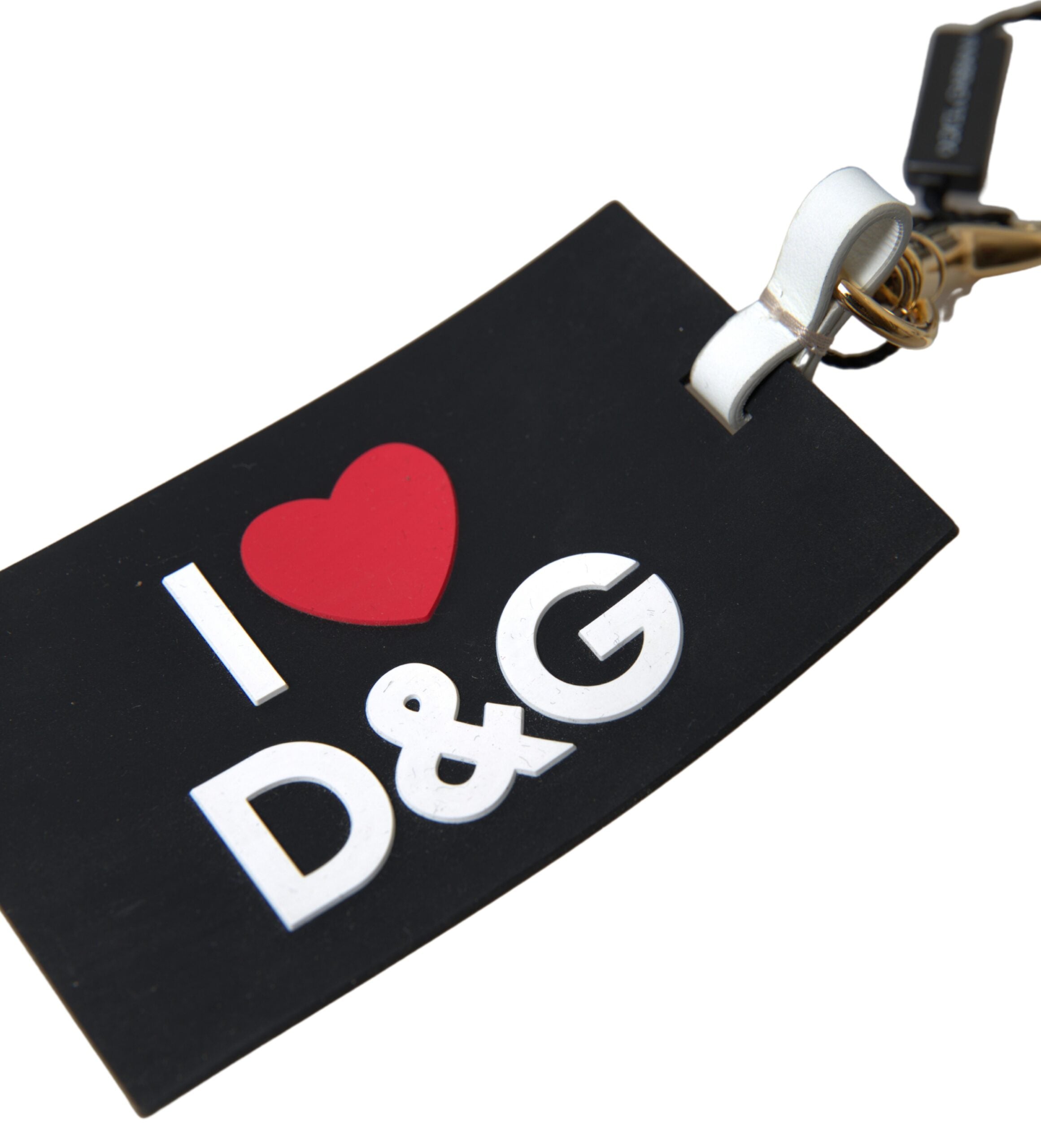 Black silicone Dolce & Gabbana keychain with gold brass DG logo, featuring a sleek and stylish design.