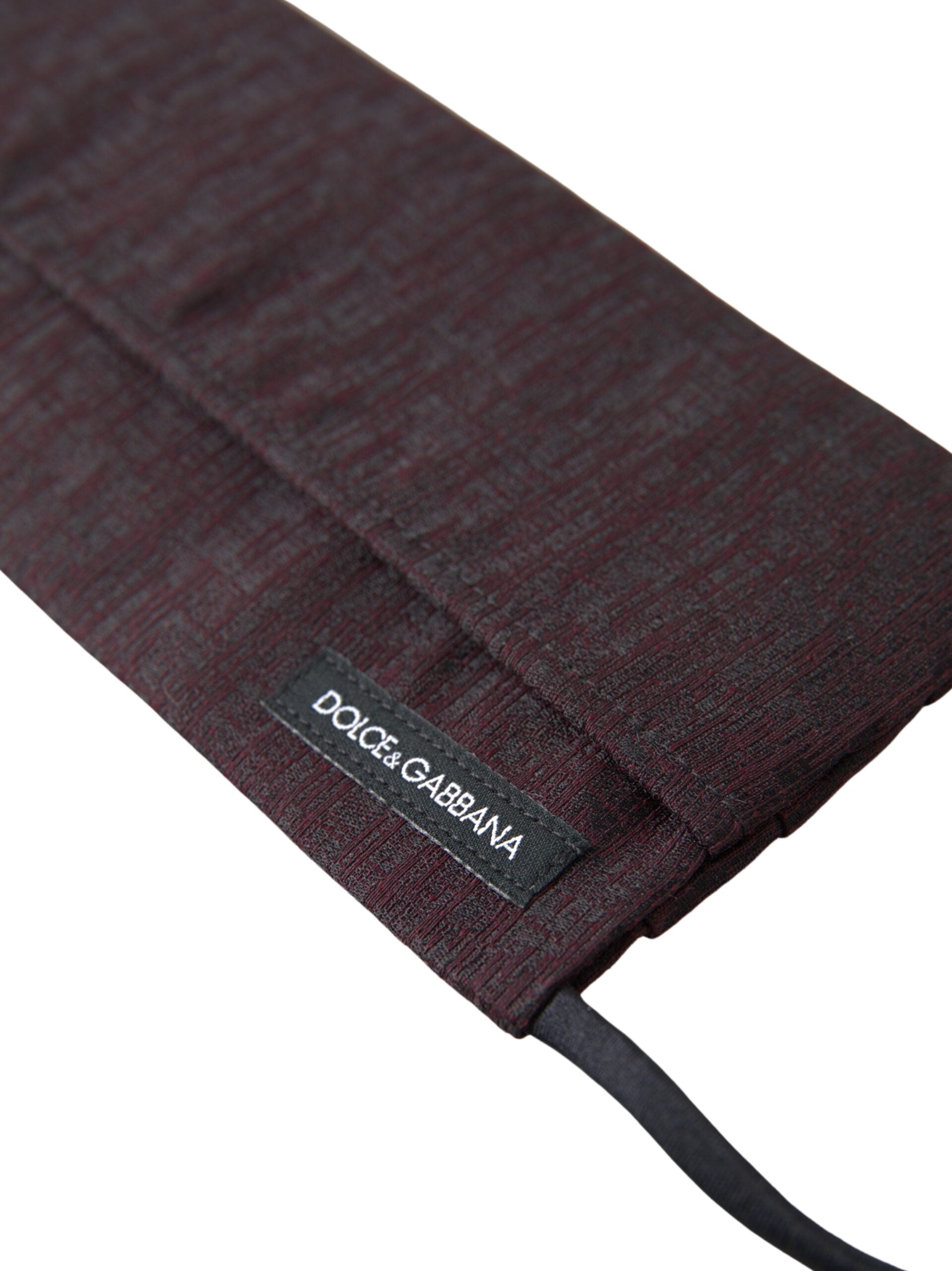 Maroon Dolce & Gabbana pleated face mask with elastic ear straps and pleated design for comfortable wear.