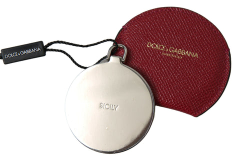 Red calfskin leather round hand mirror holder with Dolce & Gabbana branding, stylishly designed for elegant storage and protection.