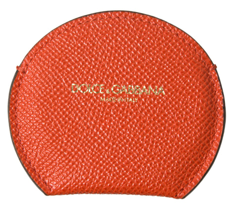 Orange calfskin leather round logo hand mirror holder by Dolce & Gabbana, featuring a sleek design with embossed logo detail.