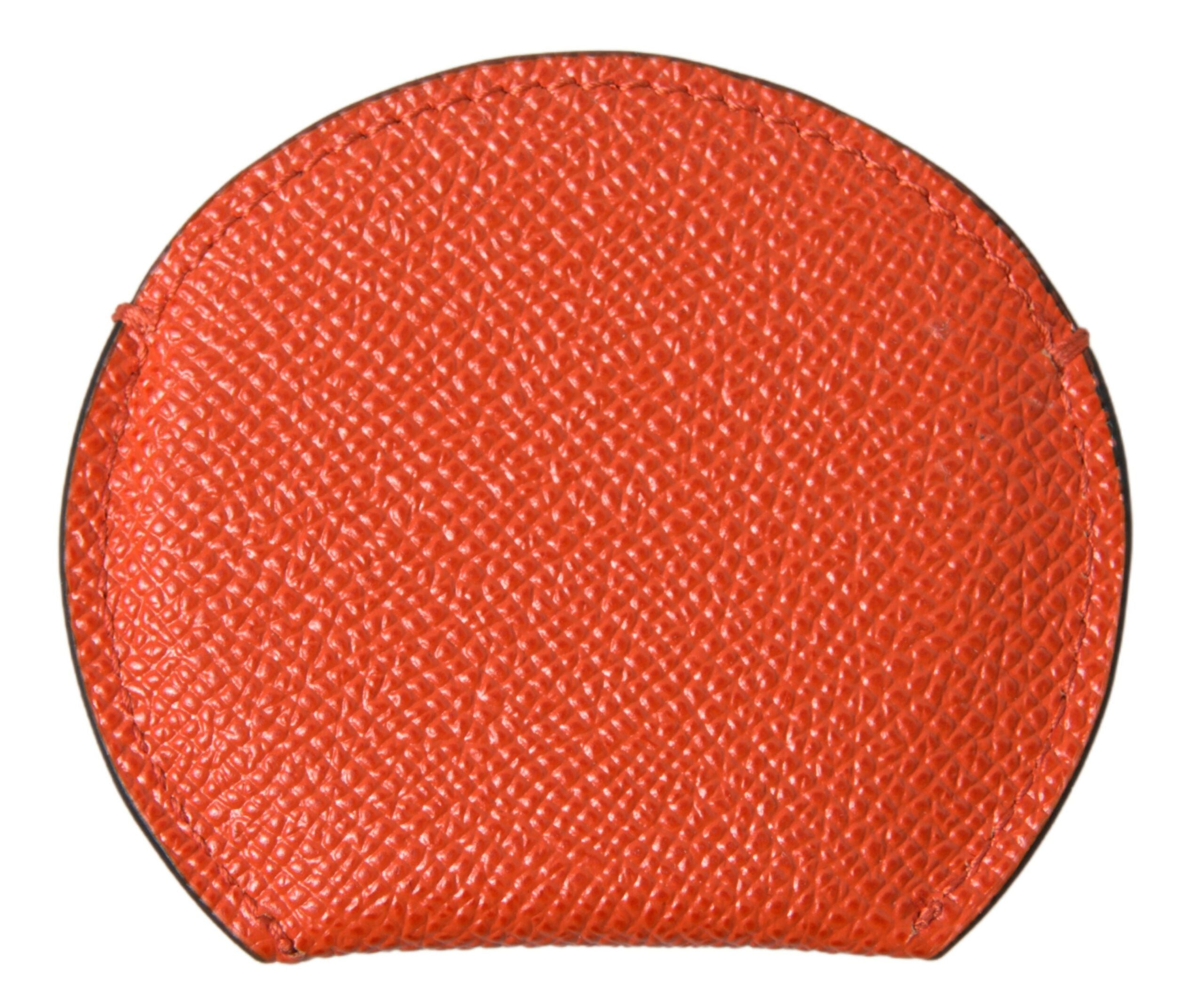 Orange calfskin leather Dolce & Gabbana round logo hand mirror holder with sleek design and textured finish.