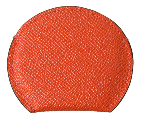 Orange calfskin leather Dolce & Gabbana round logo hand mirror holder with sleek design and textured finish.