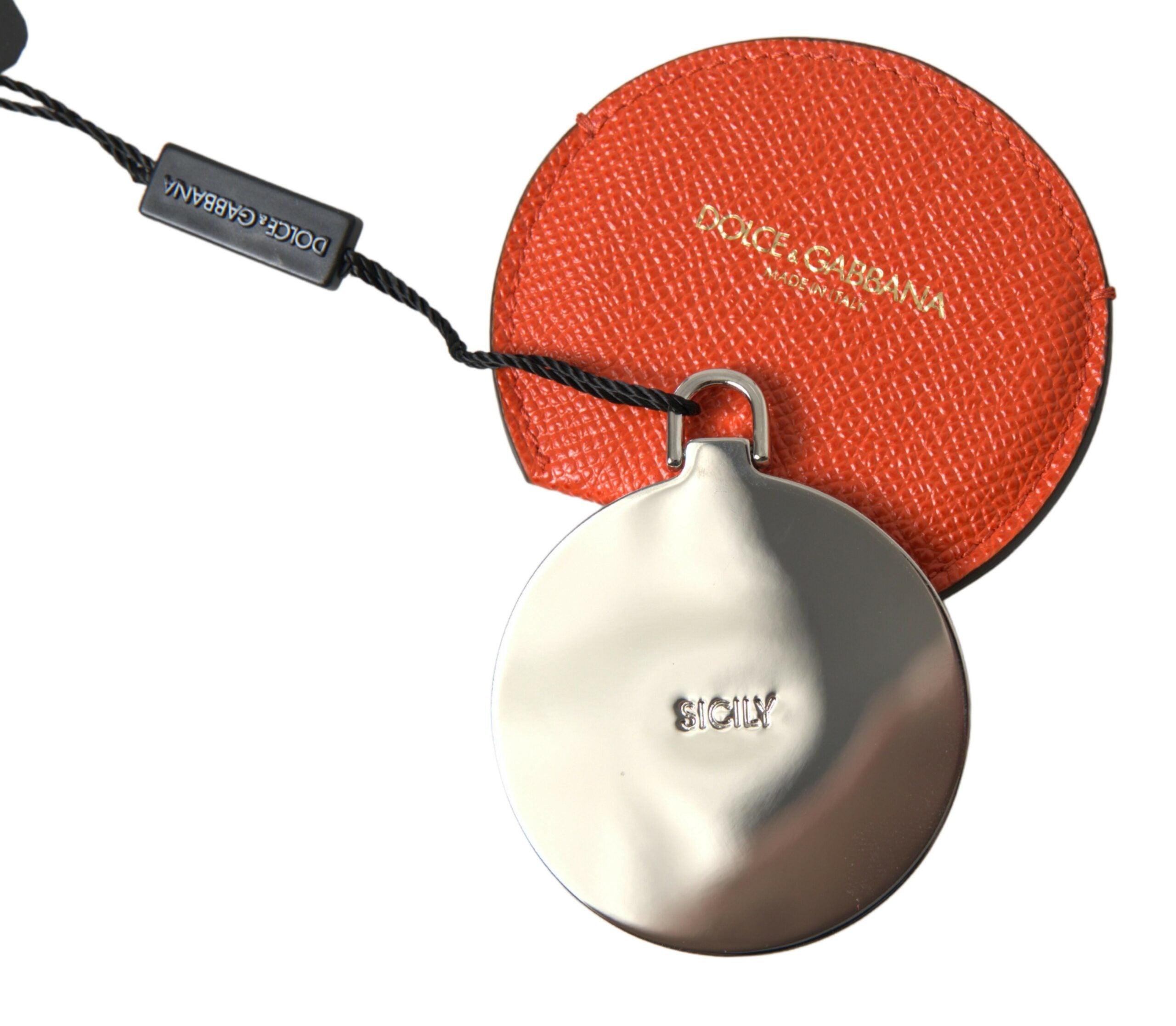 Orange calfskin leather round logo hand mirror holder by Dolce & Gabbana with a sleek, compact design and embossed logo detail.