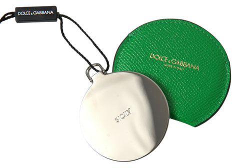 Green calfskin leather Dolce & Gabbana round logo hand mirror holder with embossed branding and smooth finish.