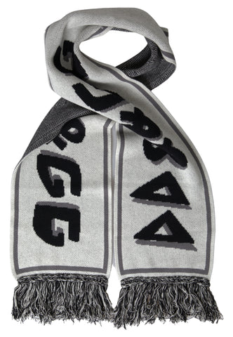 Gray cashmere knitted wrap shawl with fringe, Dolce & Gabbana fashion accessory, showcasing soft, cozy textile and stylish design.