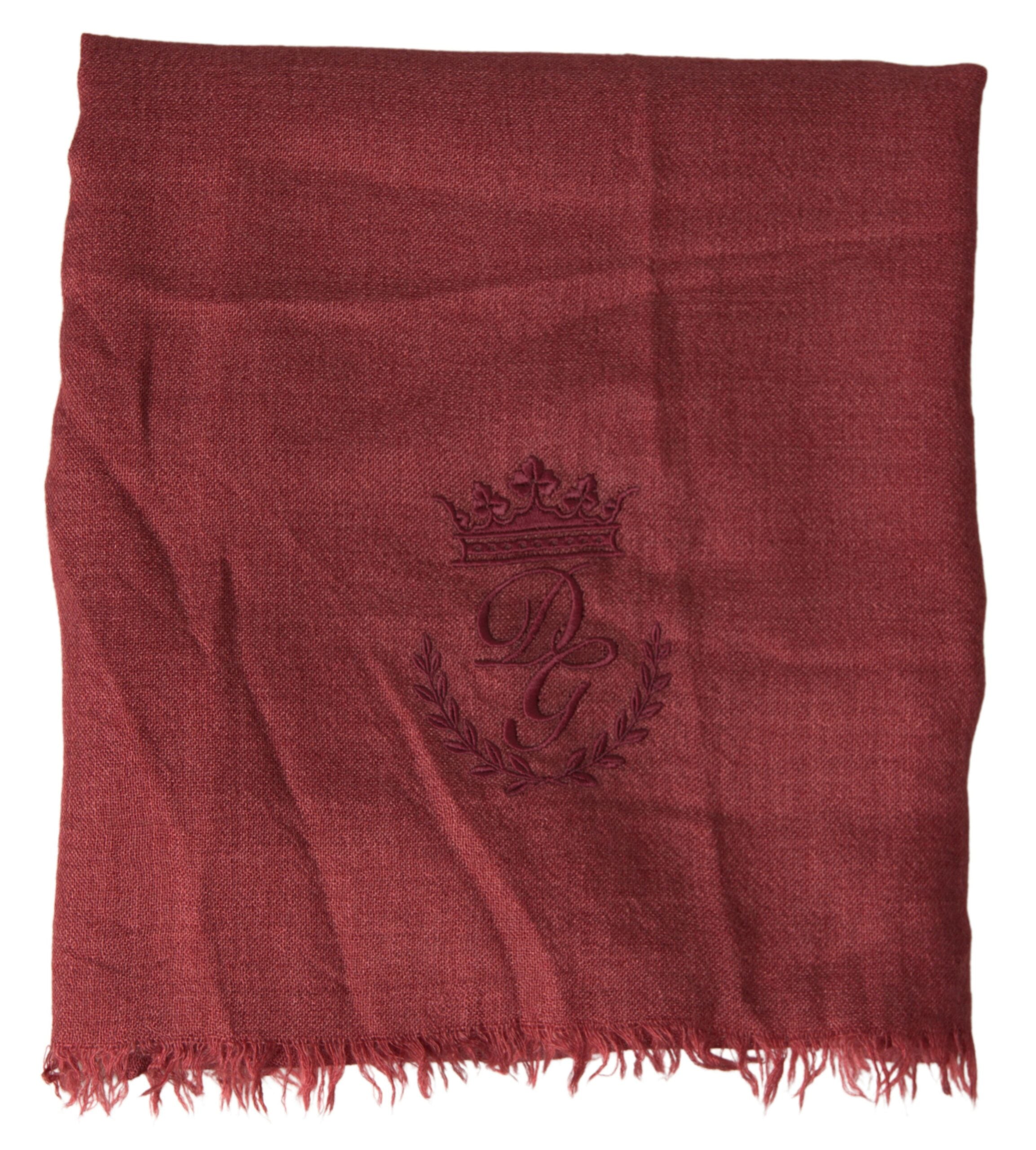 Maroon cashmere knit wrap shawl with fringe from Dolce & Gabbana, featuring soft, luxurious fabric and stylish draped design.