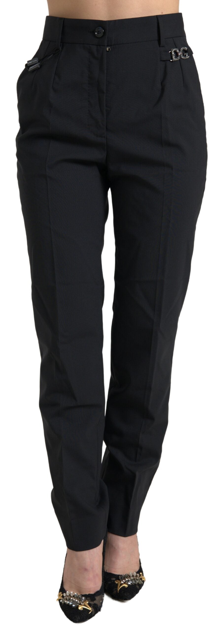 Black wool high-waist tapered pants by Dolce & Gabbana, shown on a mannequin with a tailored fit and classic design.