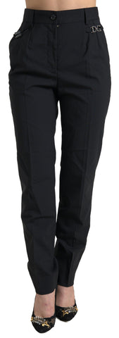 Black wool high-waist tapered pants by Dolce & Gabbana, shown on a mannequin with a tailored fit and classic design.