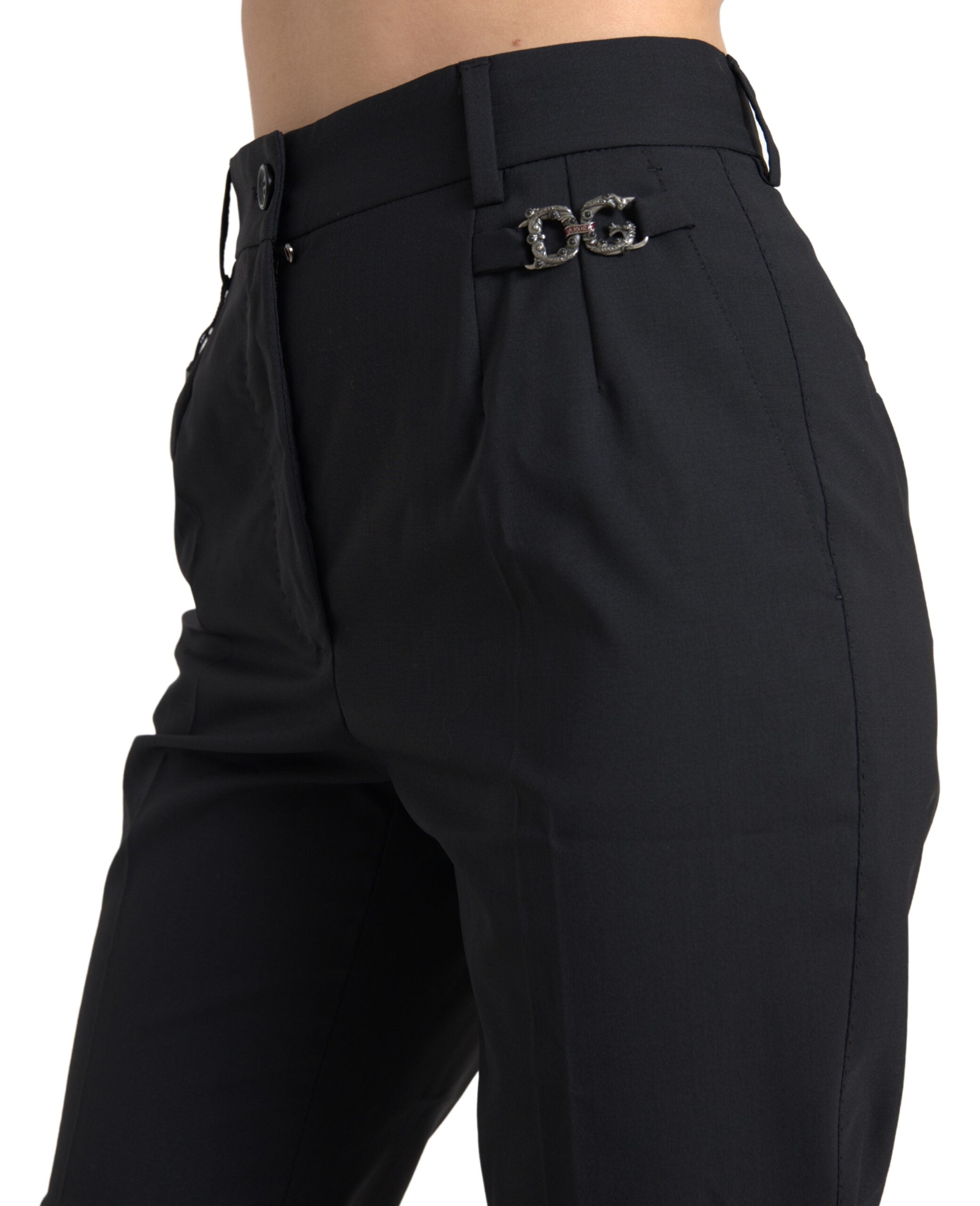Black wool high waist tapered pants by Dolce & Gabbana, shown on a model with a tailored fit and sleek design.