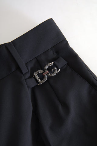 Black wool high waist tapered pants by Dolce & Gabbana, featuring a sleek fit and tailored design.