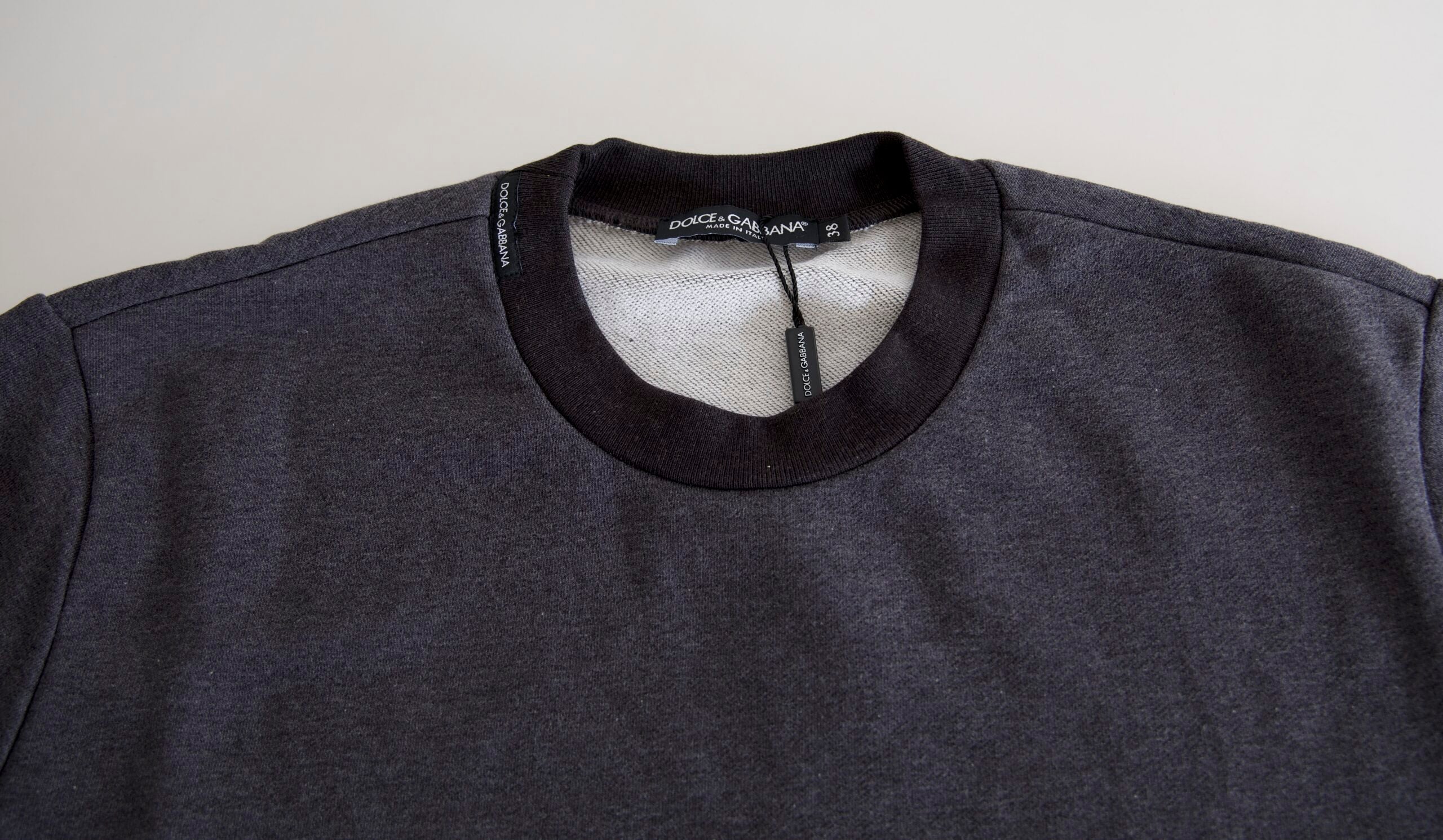 Dark gray cotton crew neck pullover sweater by Dolce & Gabbana, showing a close-up of the knit fabric and classic fit.