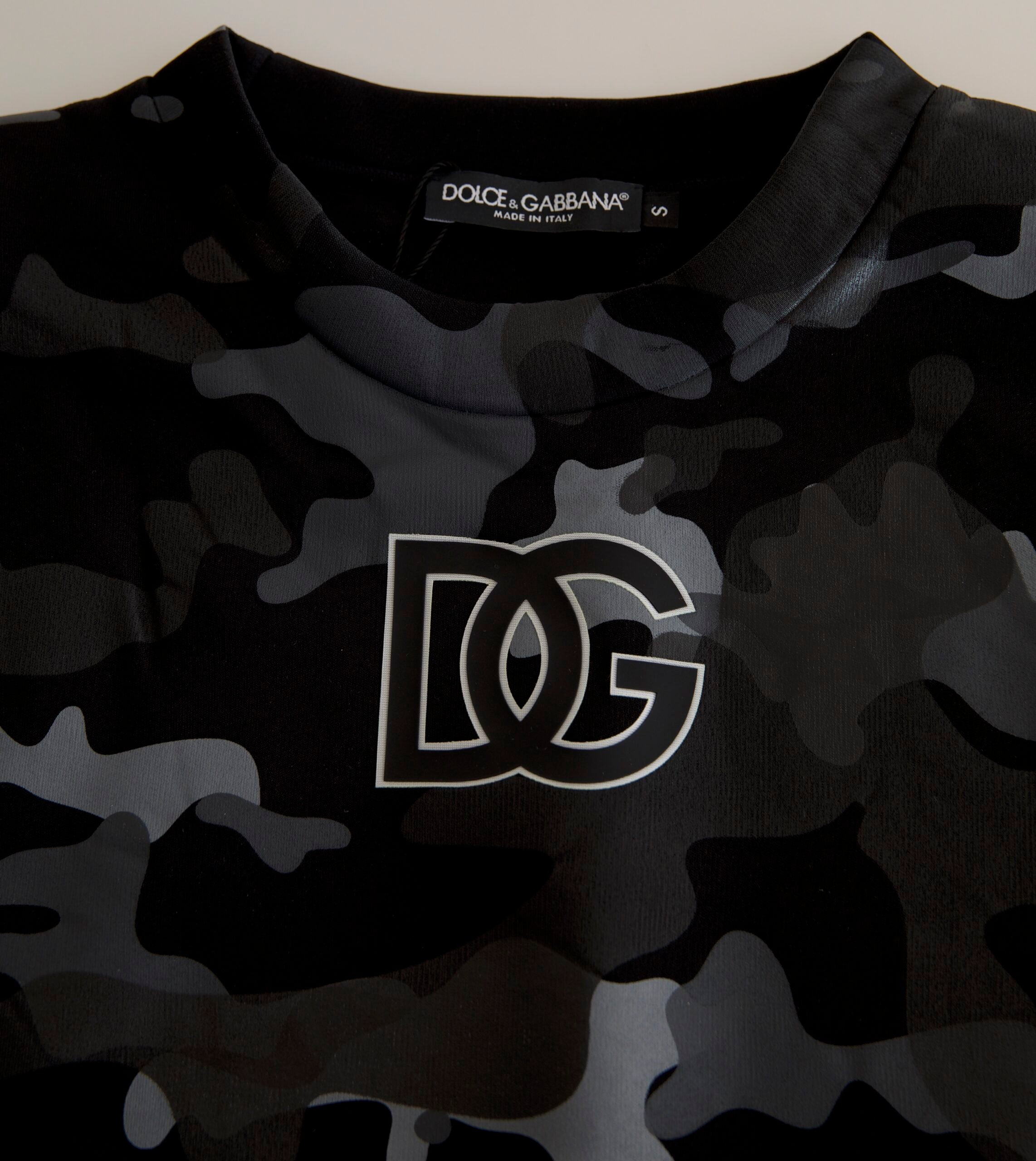 Black camouflage round neck sweatshirt by Dolce & Gabbana, featuring a casual fit and camouflage pattern on soft fabric.