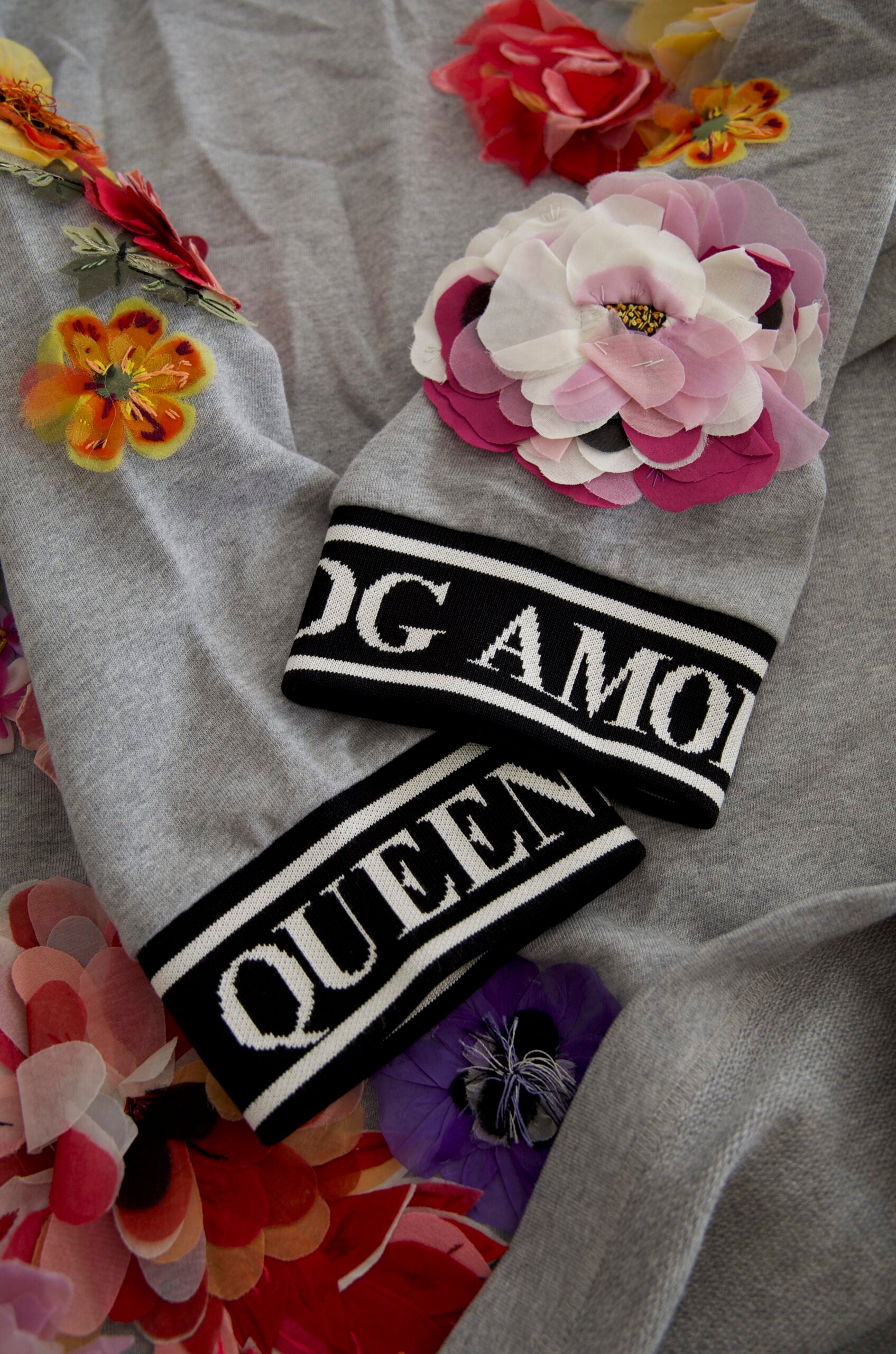 Gray Dolce & Gabbana Amore Queen floral pullover sweater with floral pattern and ribbed cuffs.
