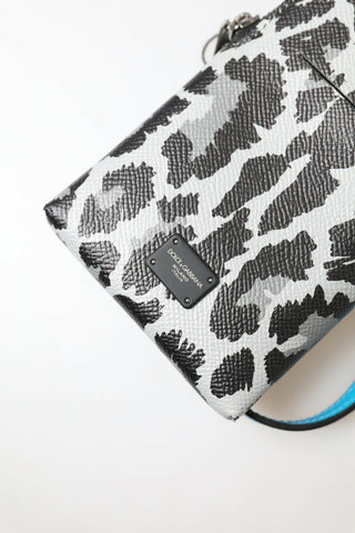 Gray leopard leather Dolce & Gabbana men's crossbody sling phone bag with adjustable strap and compact design.
