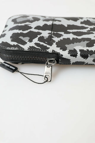 Gray leopard leather Dolce & Gabbana men's purse crossbody sling phone bag with adjustable strap and compact design.