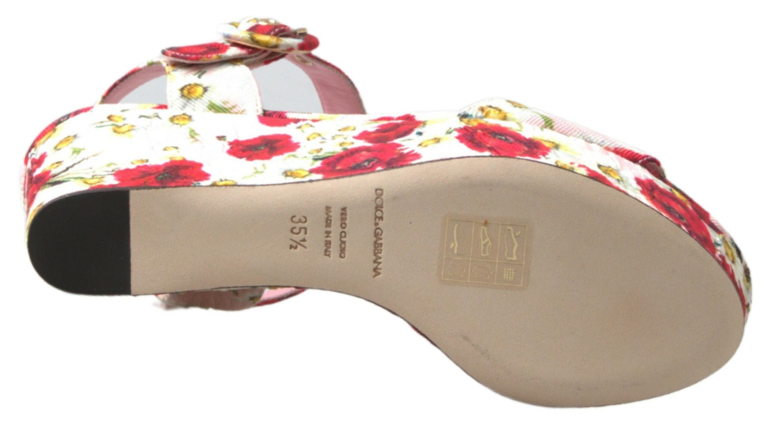 Multicolor floral print Dolce & Gabbana wedge sandals with ankle strap, featuring vibrant floral design and comfortable heel.
