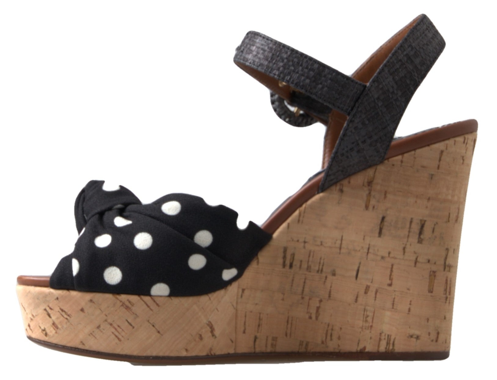 Black polka dot wedge sandals with ankle straps by Dolce & Gabbana, featuring a stylish and comfortable open-toe design.