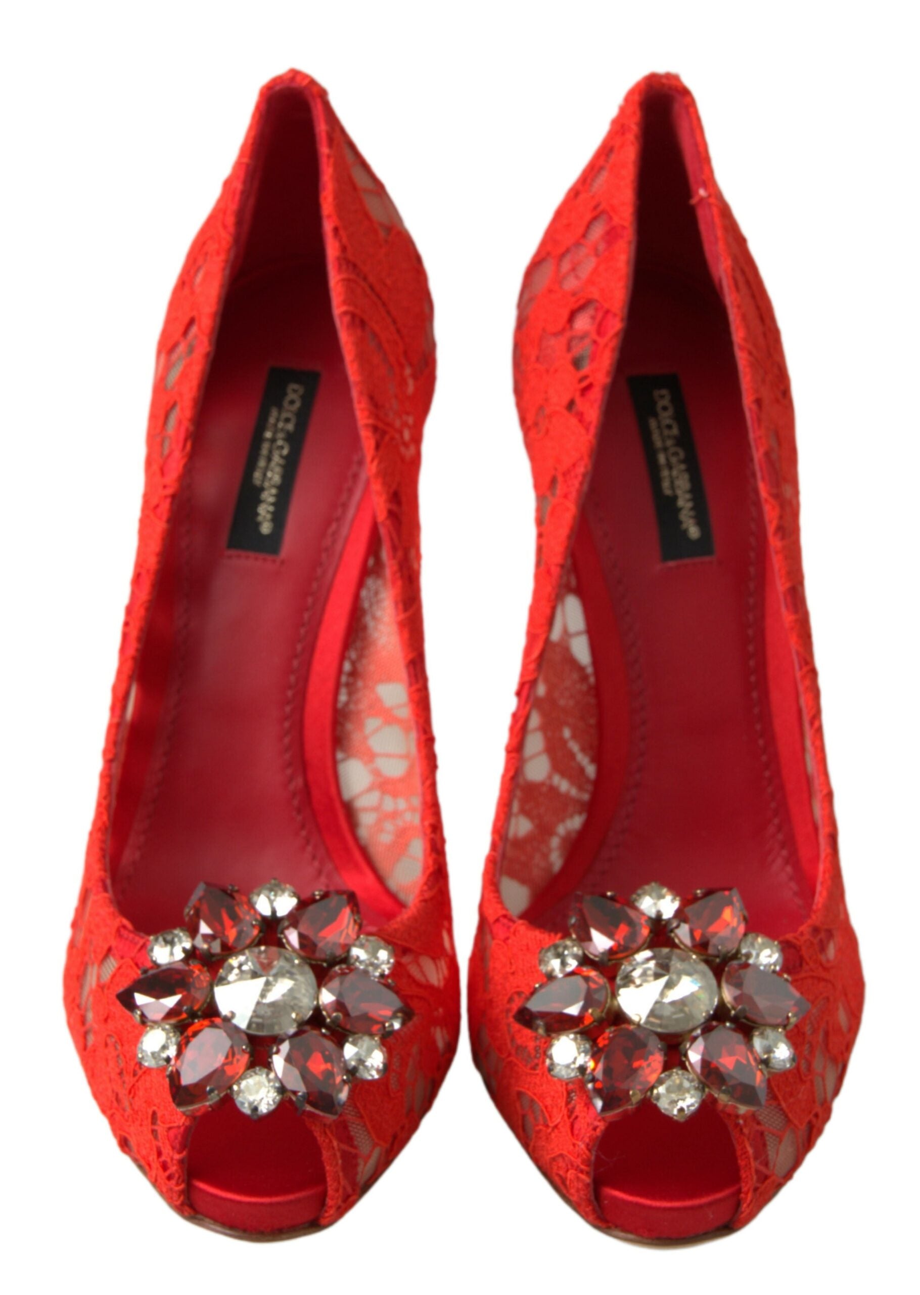 Red Taormina lace crystal heels pumps shoes by Dolce & Gabbana with intricate lace details and sparkling crystal embellishments.