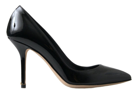 Black patent leather high heel pumps by Dolce & Gabbana, stylish pointed toe shoes with sleek glossy finish.