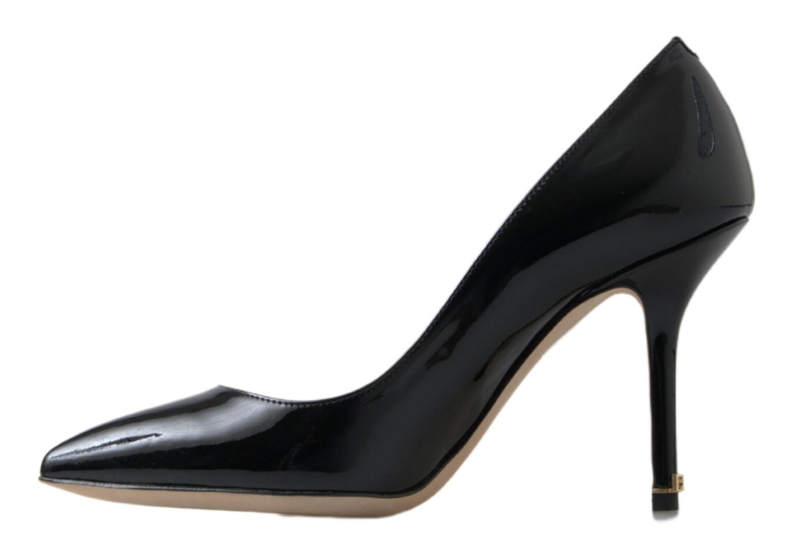 Black patent leather high heel pumps by Dolce & Gabbana, stylish women's shoes with a sleek, glossy finish.