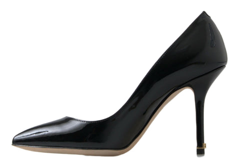 Black patent leather high heel pumps by Dolce & Gabbana, stylish women's shoes with a sleek, glossy finish.