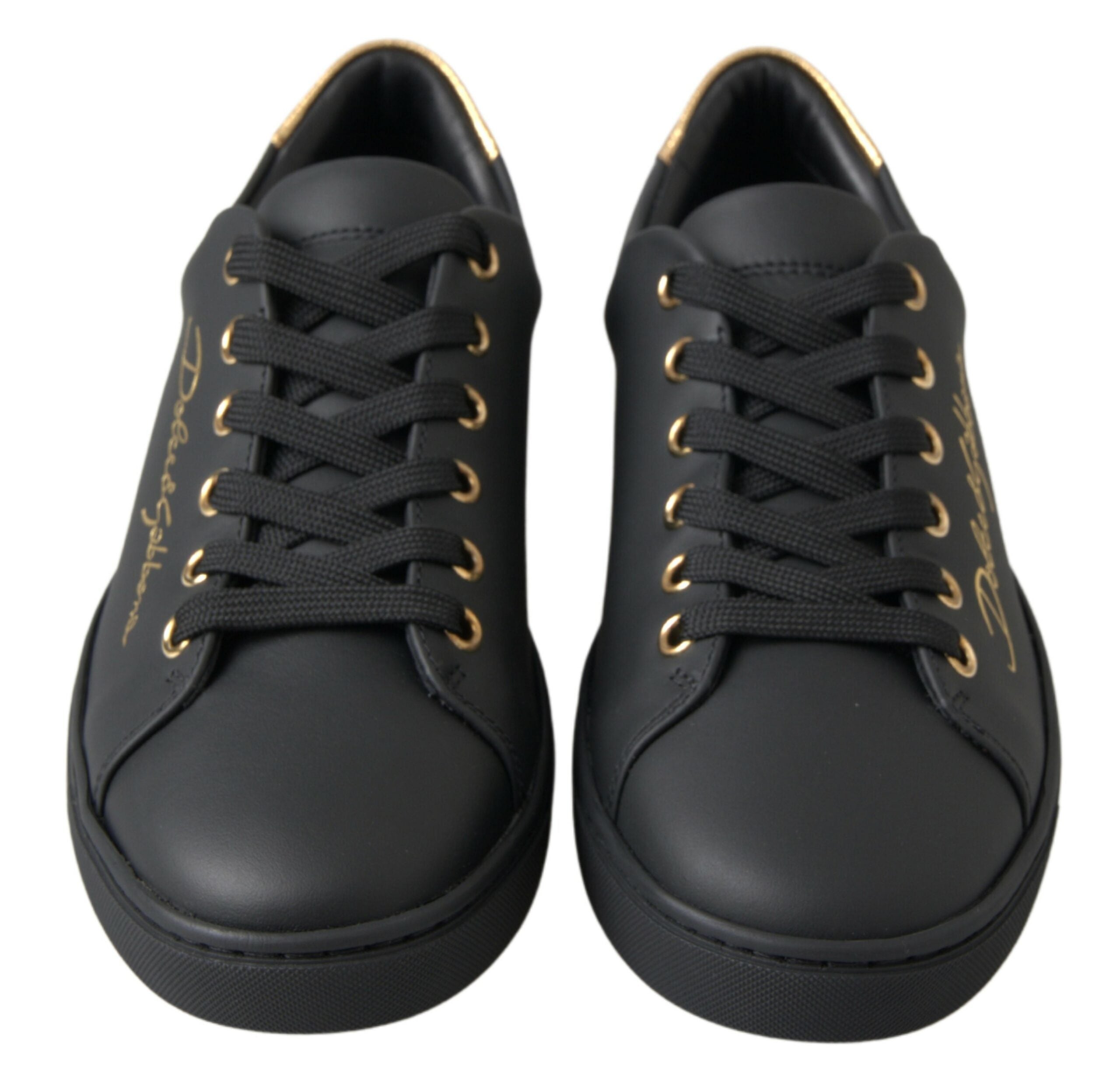 Black gold leather Dolce & Gabbana classic sneakers with stylish design and white rubber sole.