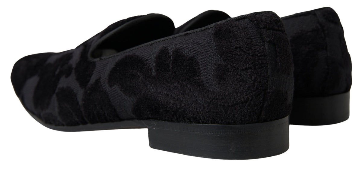 Black brocade loafers by Dolce & Gabbana, formal shoes with intricate pattern and sleek design, suitable for elegant occasions.