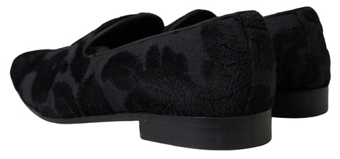 Black brocade loafers by Dolce & Gabbana, formal shoes with intricate pattern and sleek design, suitable for elegant occasions.