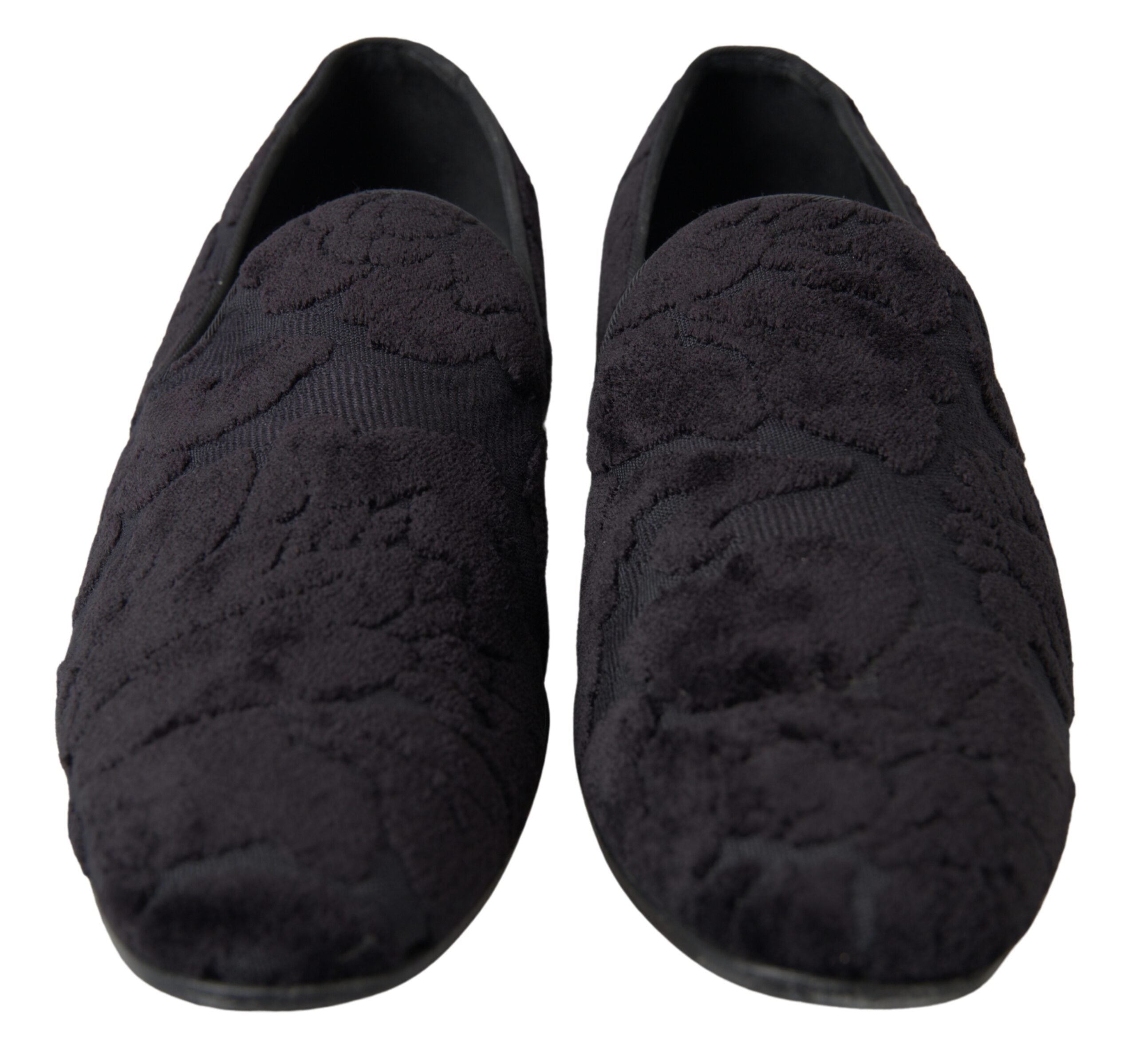 Black brocade loafers by Dolce & Gabbana featuring a formal shoe design with intricate pattern details.