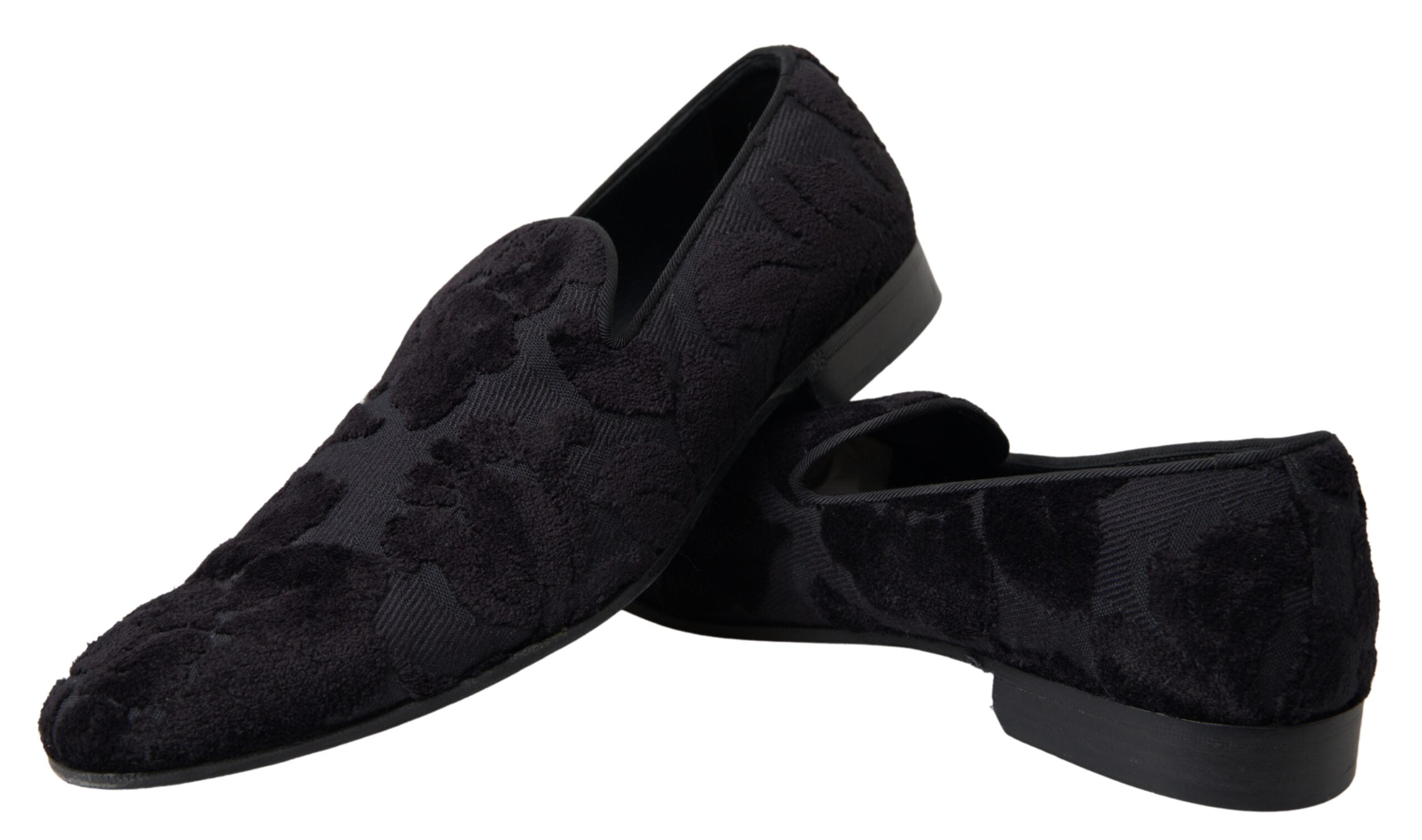 Black brocade loafers by Dolce & Gabbana, formal shoes with intricate woven fabric and sleek design, suitable for elegant occasions.