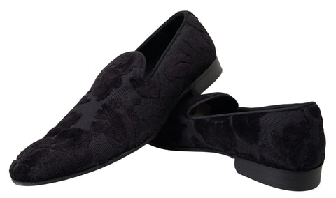 Black brocade loafers by Dolce & Gabbana, formal shoes with intricate woven fabric and sleek design, suitable for elegant occasions.