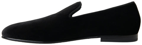 Black velvet loafers by Dolce & Gabbana, formal shoes with sleek design and classic style for sophisticated outfits.