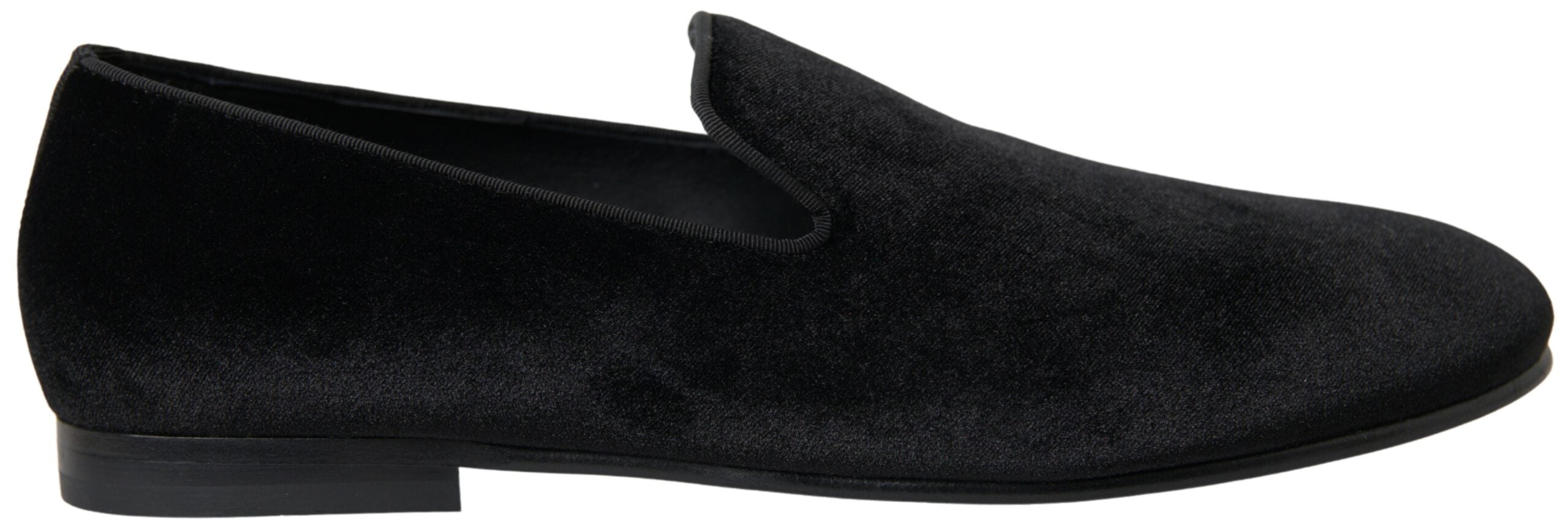 Black velvet loafers by Dolce & Gabbana, stylish formal shoes with a sleek design and polished finish.