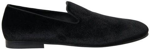 Black velvet loafers by Dolce & Gabbana, stylish formal shoes with a sleek design and polished finish.