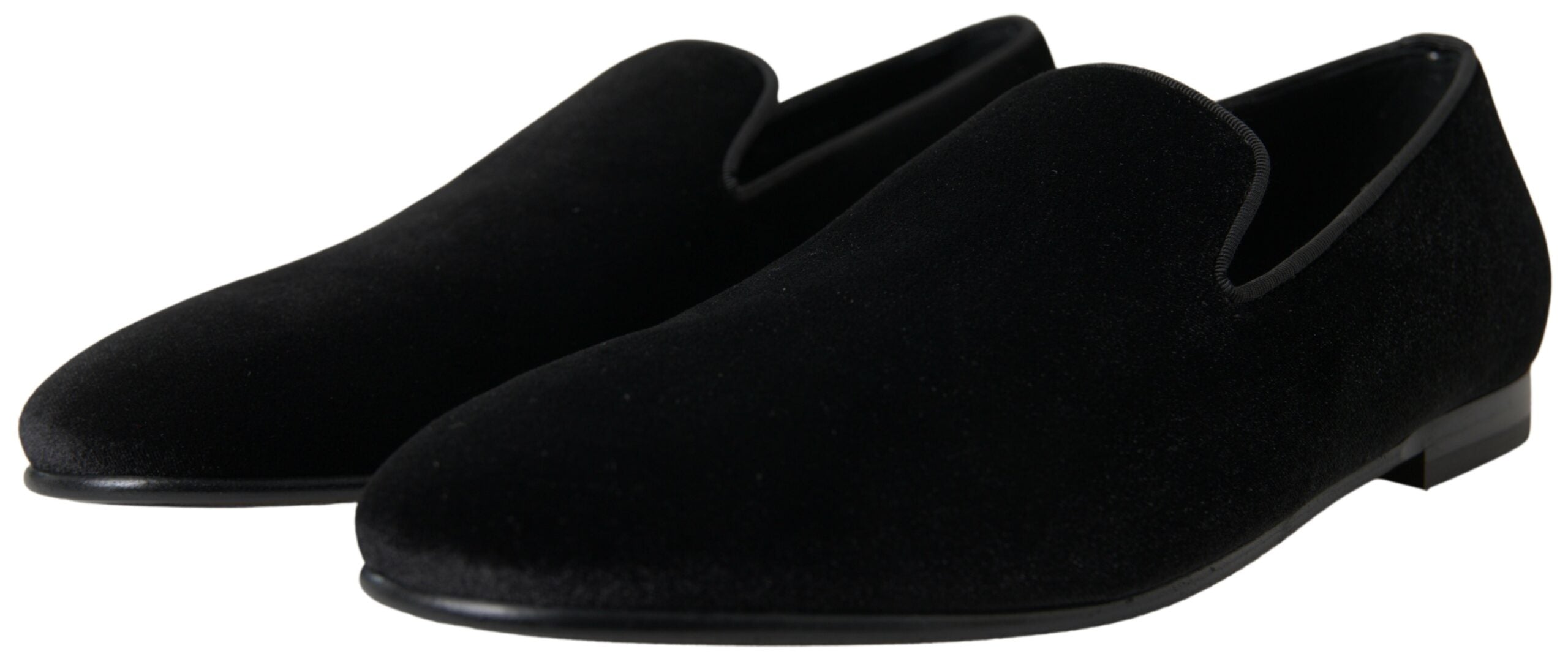 Black velvet loafers by Dolce & Gabbana, formal shoes with sleek design and elegant detailing, ideal for sophisticated occasions.