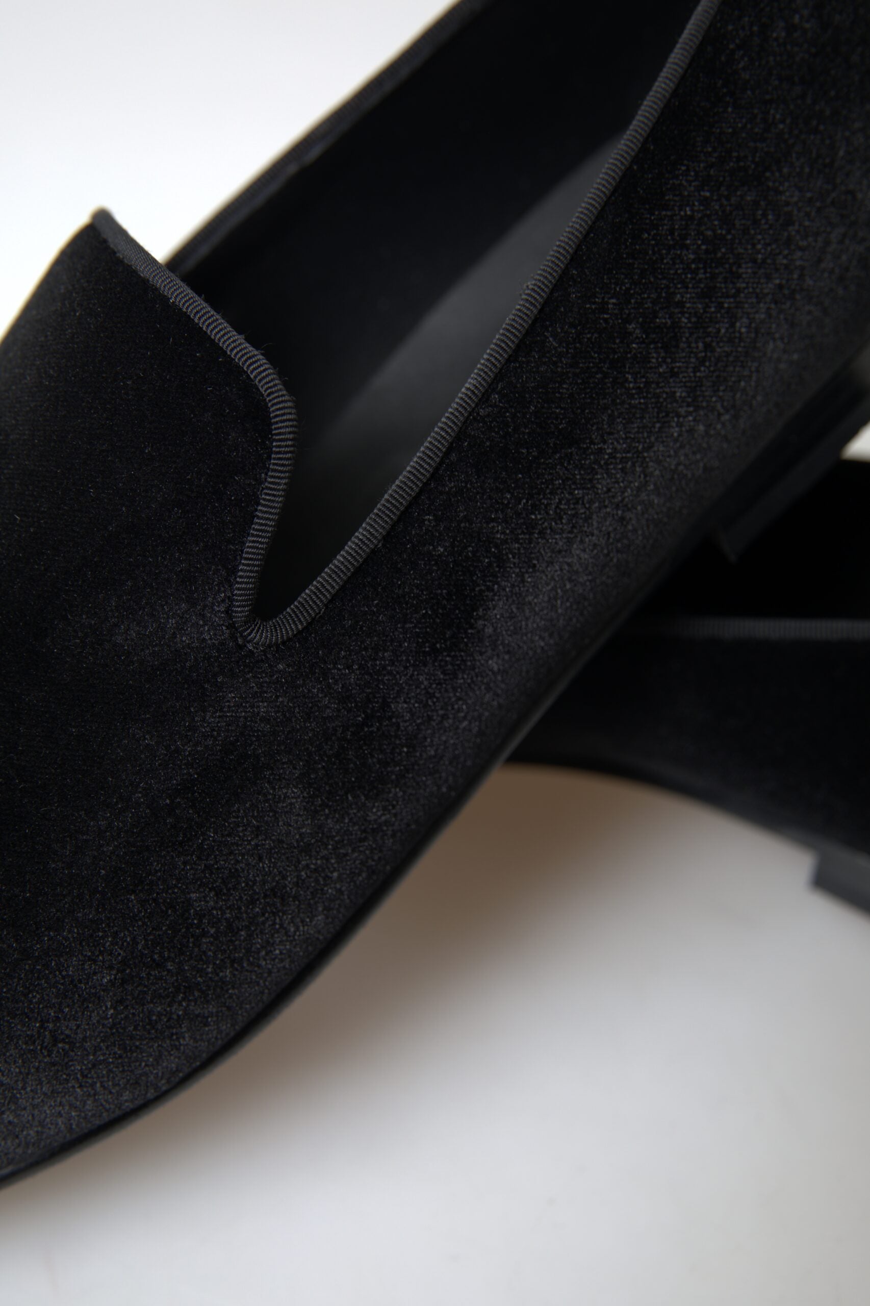 Black velvet loafers by Dolce & Gabbana, formal shoes with sleek design and refined craftsmanship, perfect for elegant occasions.
