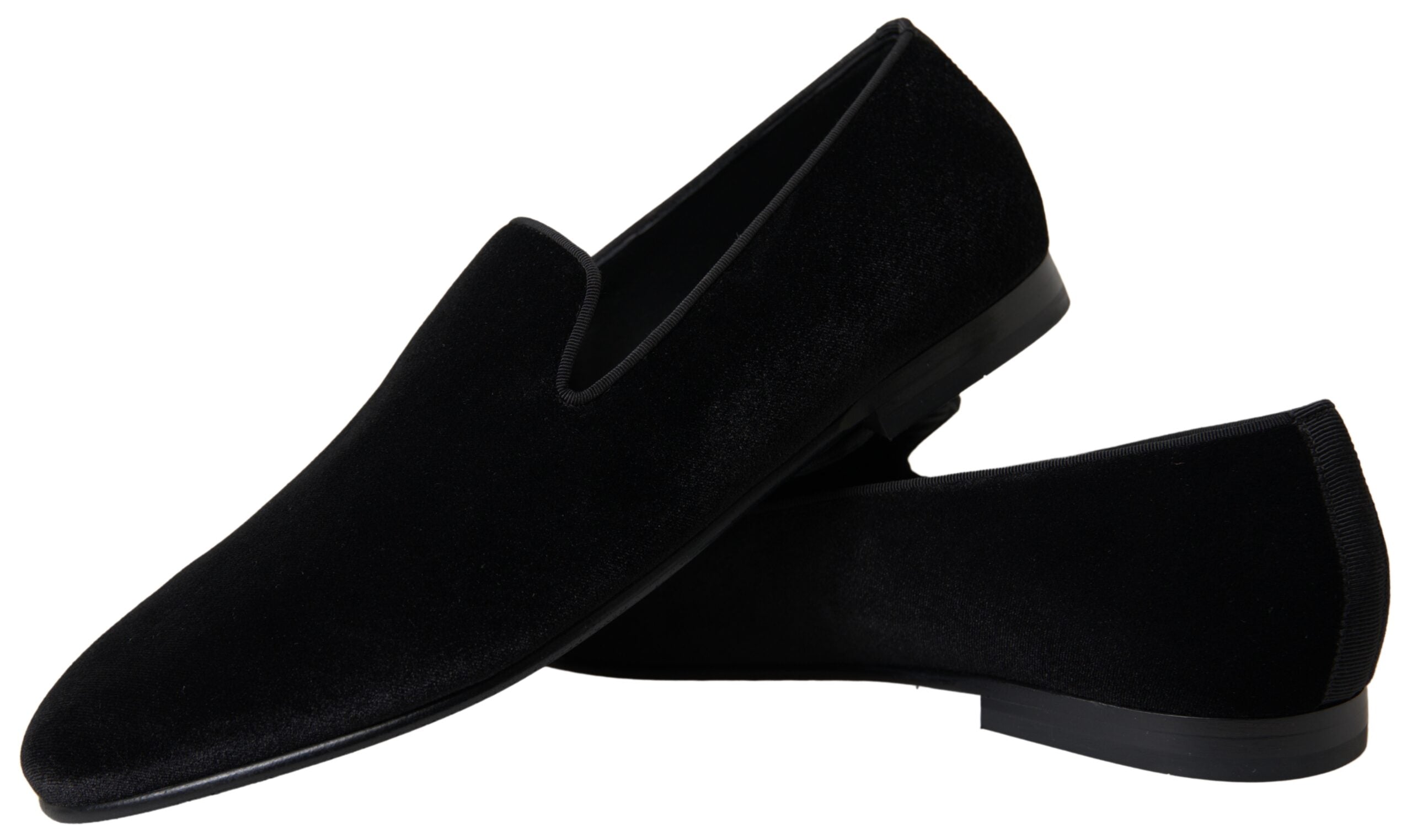 Black velvet loafers by Dolce & Gabbana, formal slip-on shoes with sleek design and refined craftsmanship.