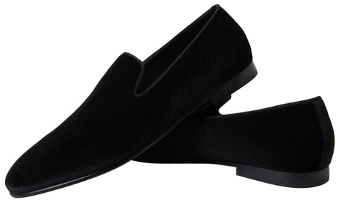Black velvet loafers by Dolce & Gabbana, formal slip-on shoes with sleek design and refined craftsmanship.