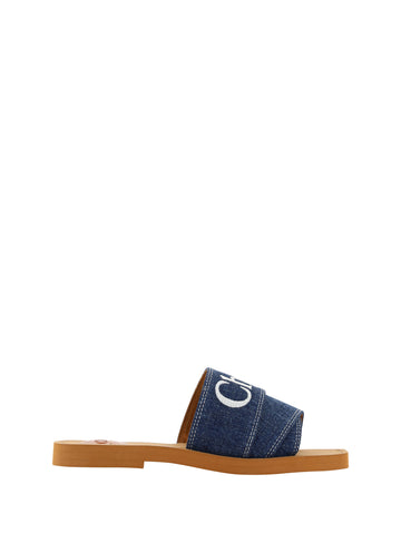 Chloé denim blue cotton slides sandals with a casual slip-on design and cushioned sole, perfect for everyday wear.