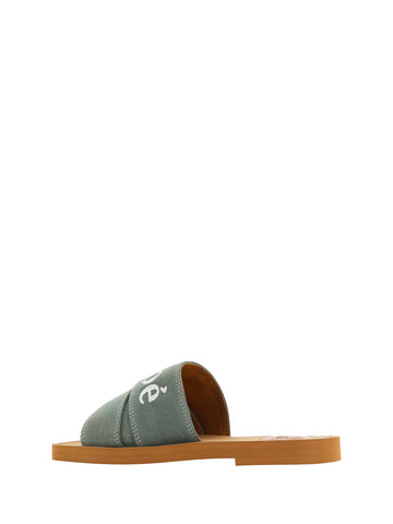 Forest green cotton slides by Chloé featuring woody sandals with open-toe design and comfortable slip-on style.